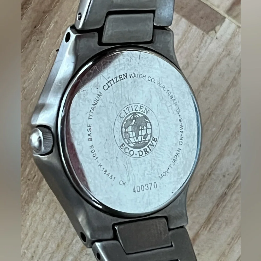 Citizen Eco-Drive Titanium Solar Black Dial Day Date Window Titanium Bracelet
